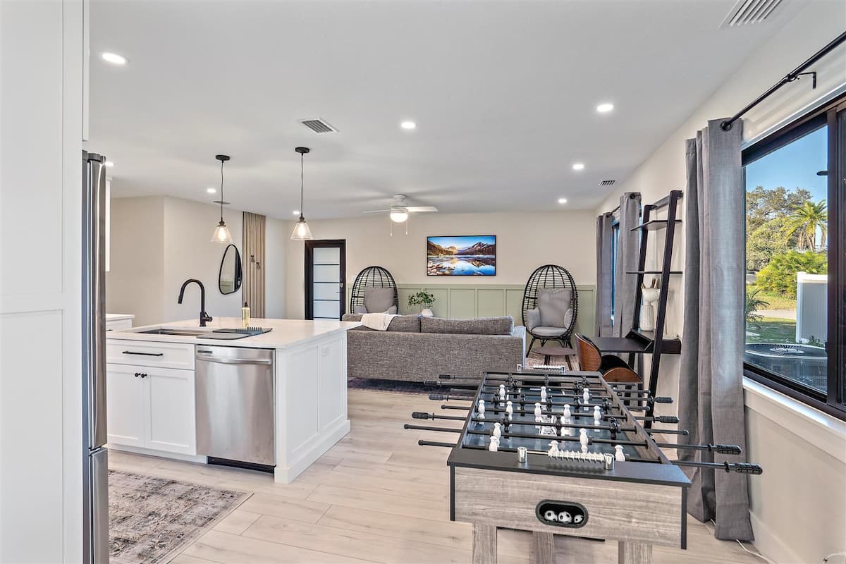 Walk back past the kitchen to get to the hallway where all three bedrooms are located.