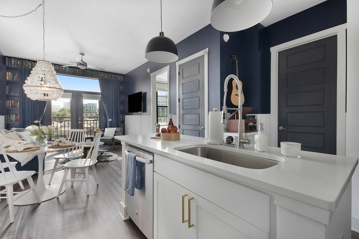 Fully Stocked Kitchen with Modern Appliances and Ample Storage
