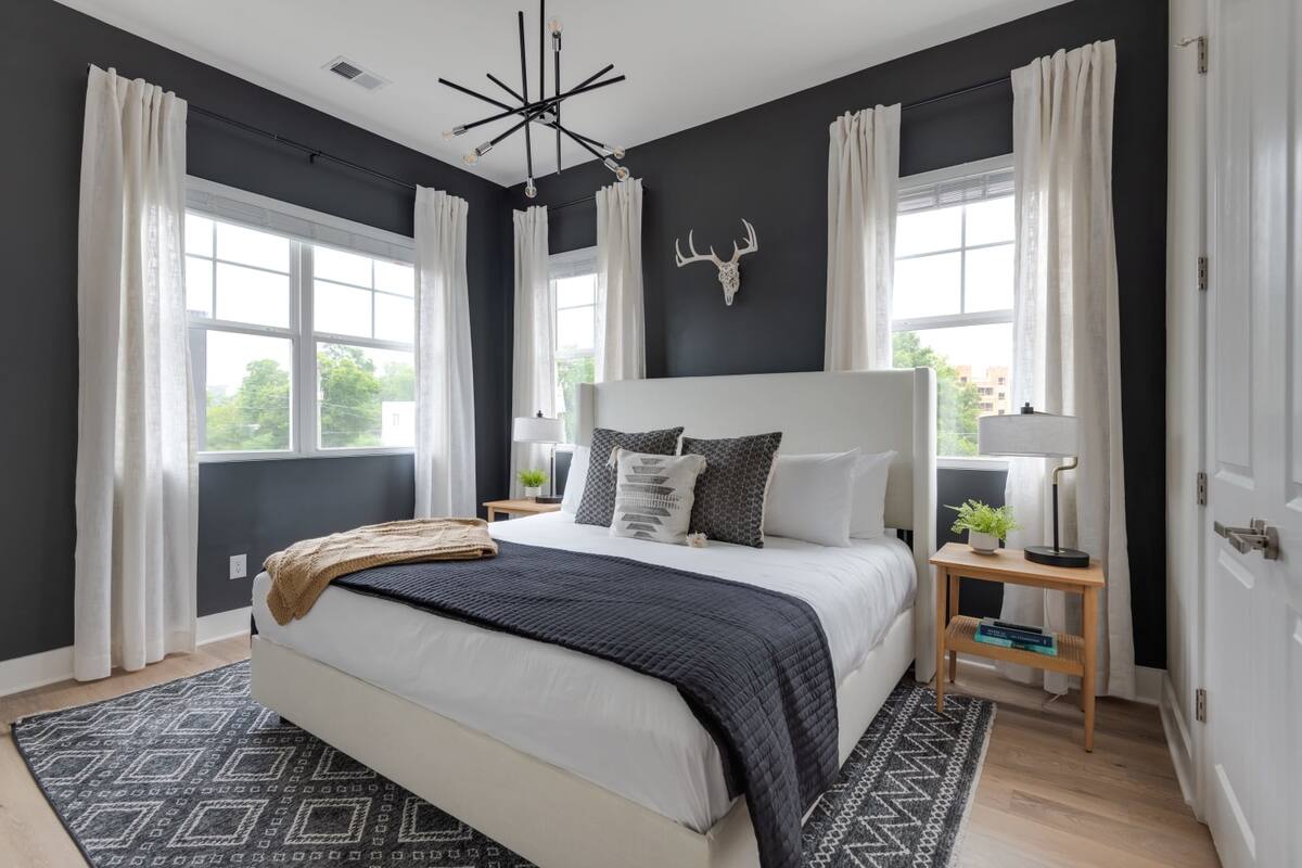 Spacious Bedroom with Soft Lighting and Thoughtful Décor
