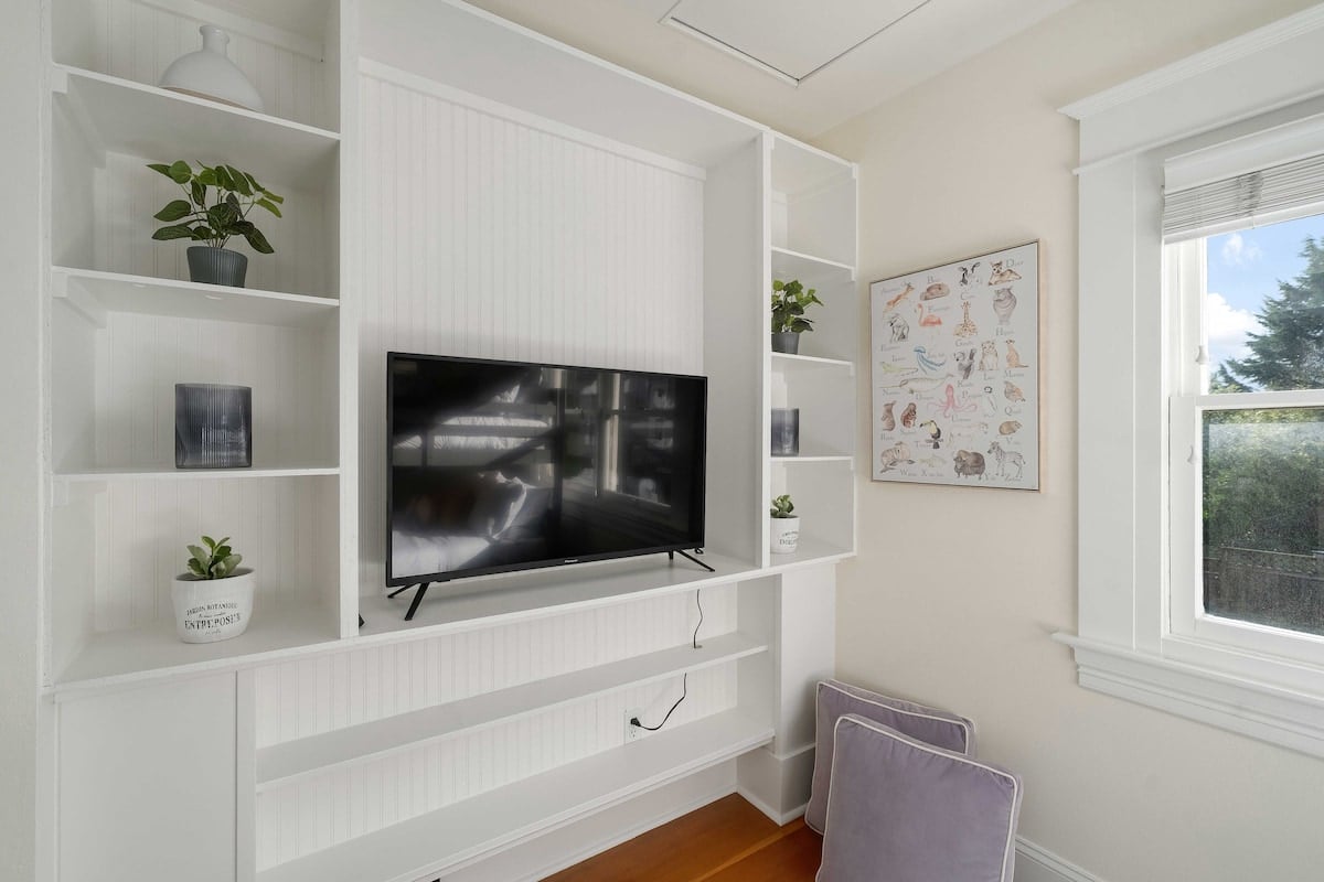 TV allows for viewing from a room separate from living room! 