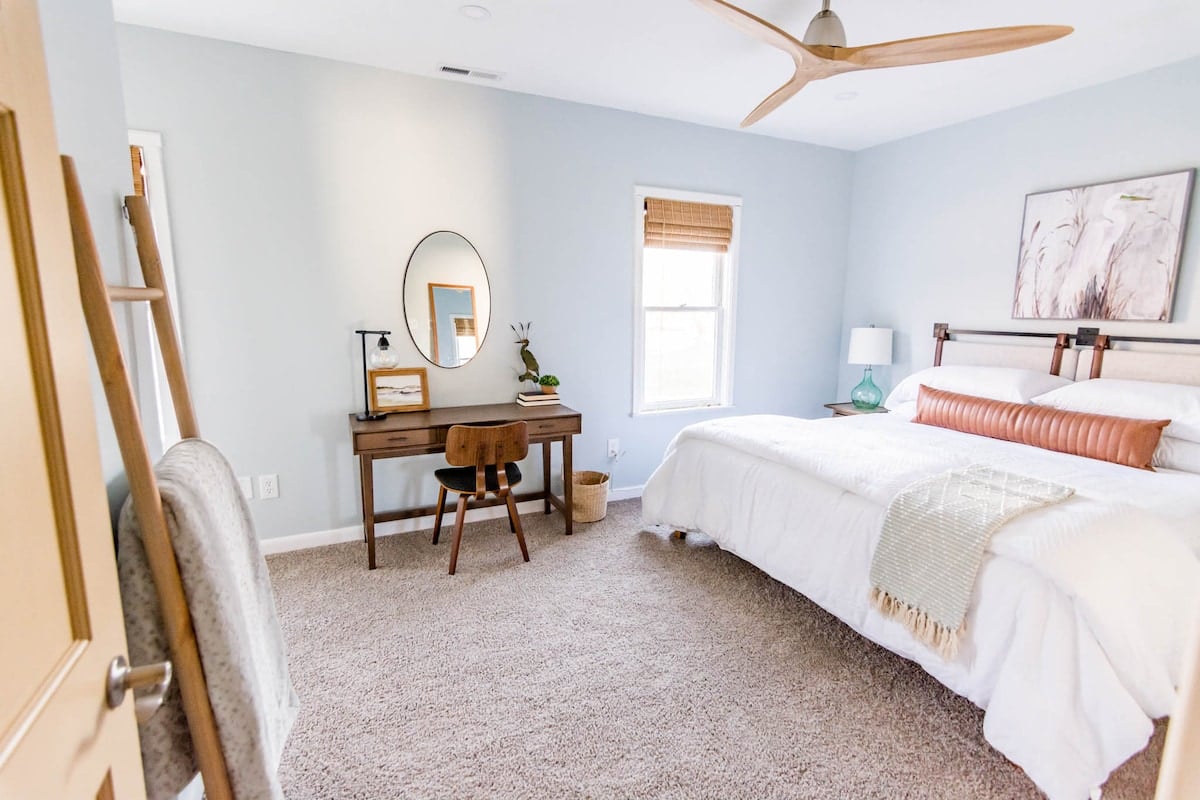 You'll love the natural light in this tranquil bedroom.