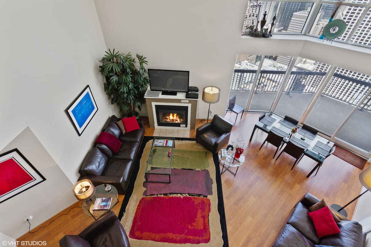 A view looking down at the Great Room and fireplace