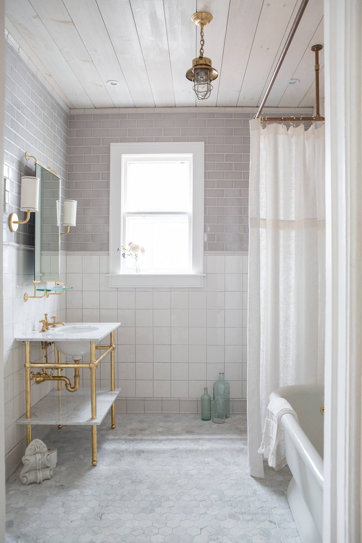 The spa-like luxury bath features heated marble flooring