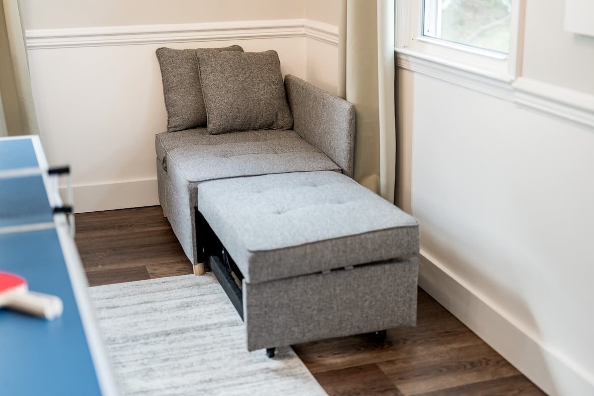 This corner chair converts into a small bed.