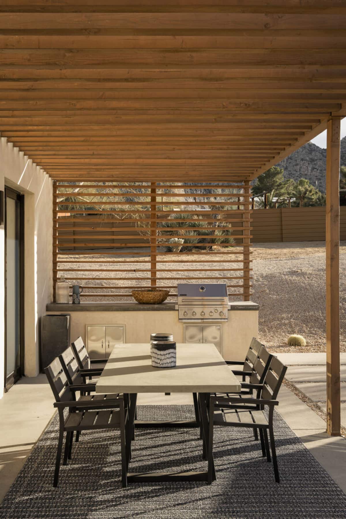 Outdoor kitchen with grill.