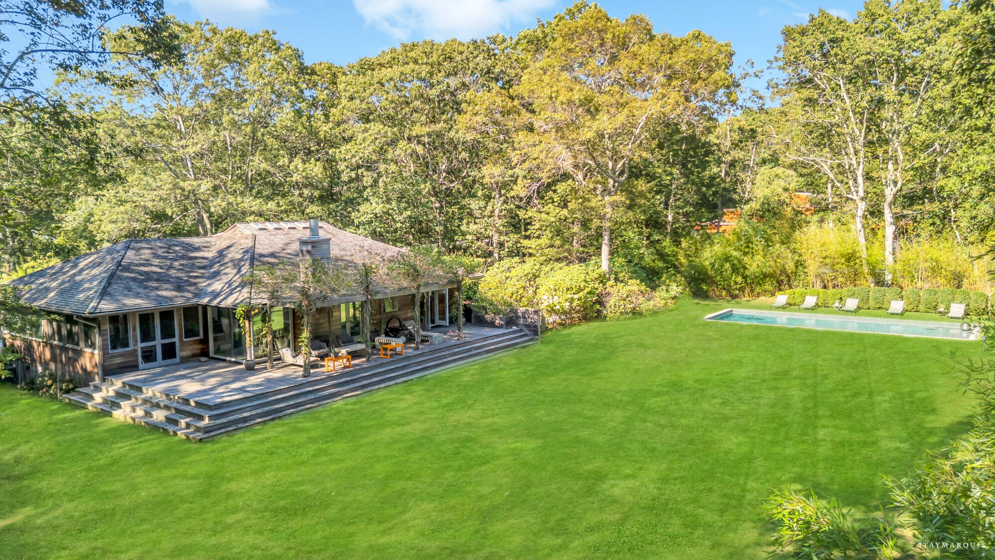 A modern residence dressed in Southampton light in Southampton, NY