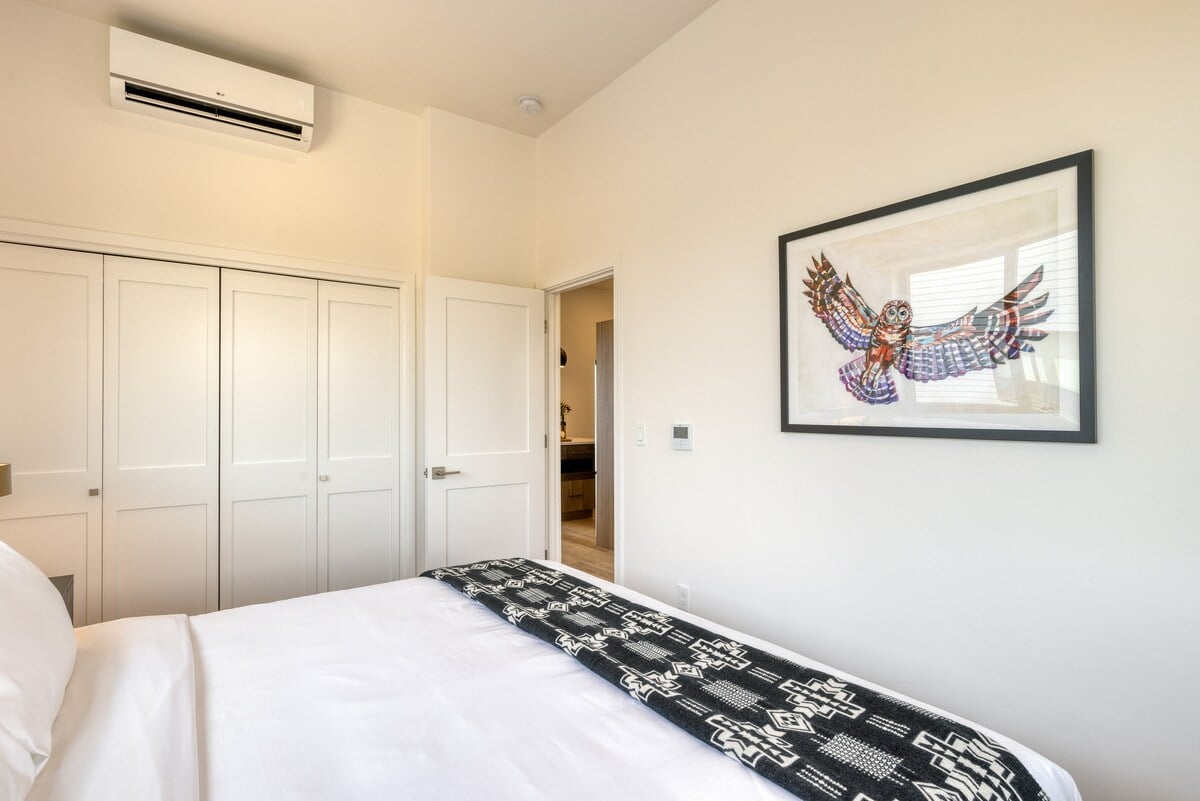 The primary bedroom features a king bed.
