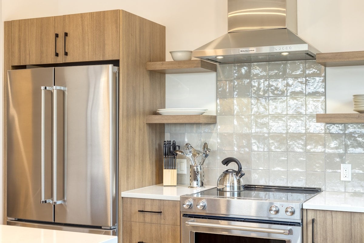 Modern kitchen with island seating and sleek finishes.