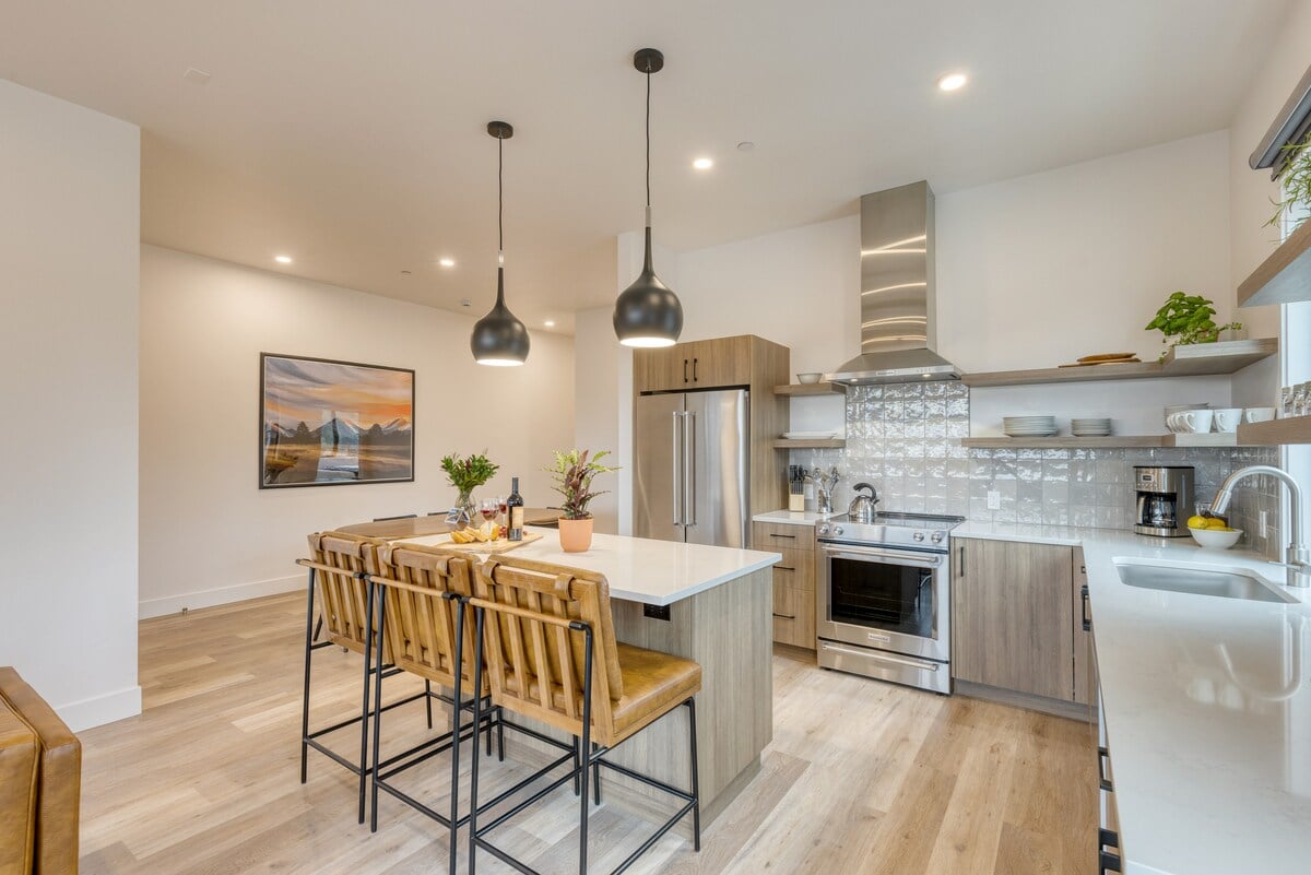Modern kitchen with island seating and sleek finishes.