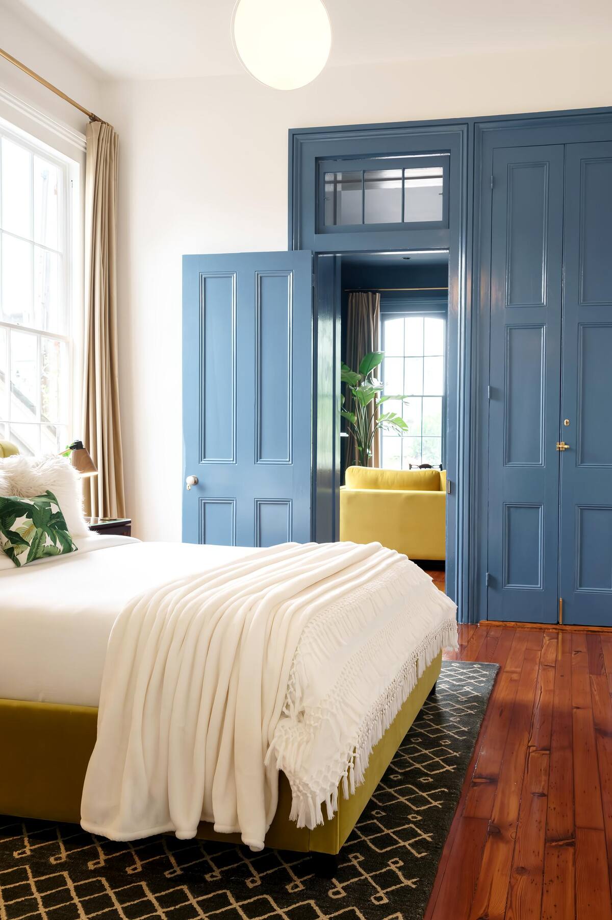 Stunning original architectural details remain, including elegant 8' doors with transom windows, and 10' closet doors.