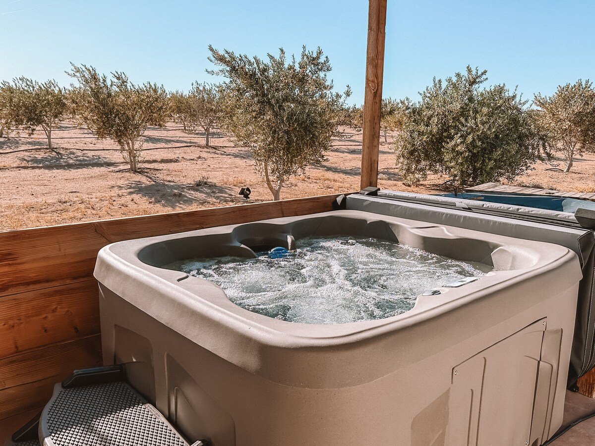 Newly installed permanent hot tub with olive orchard views 