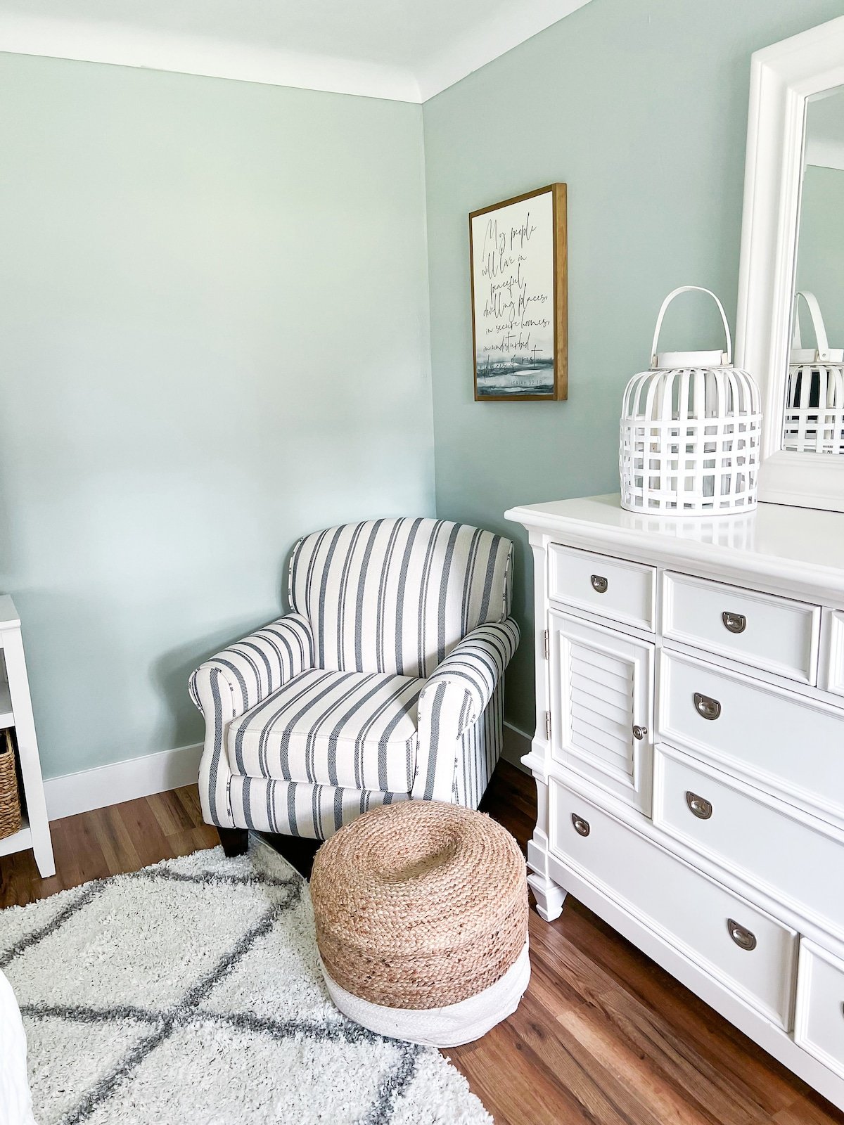 Chair with ottoman for seating and a dresser for clothing storage