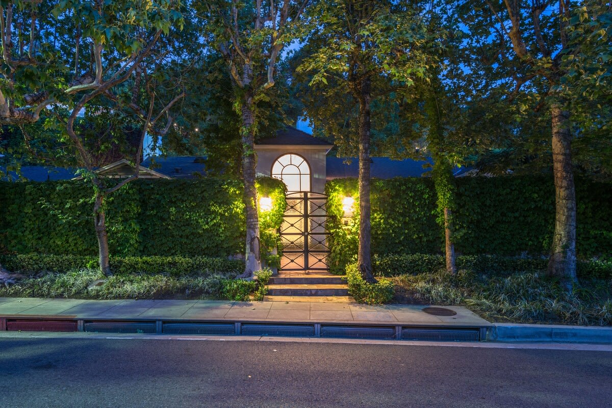 Behind the gates, a private pool house designed for staying awhile in Beverly Hills, CA