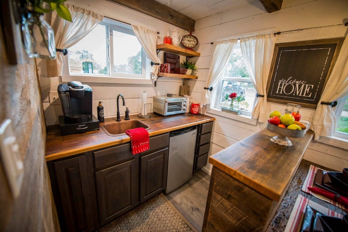 Cute kitchen has everything you need.