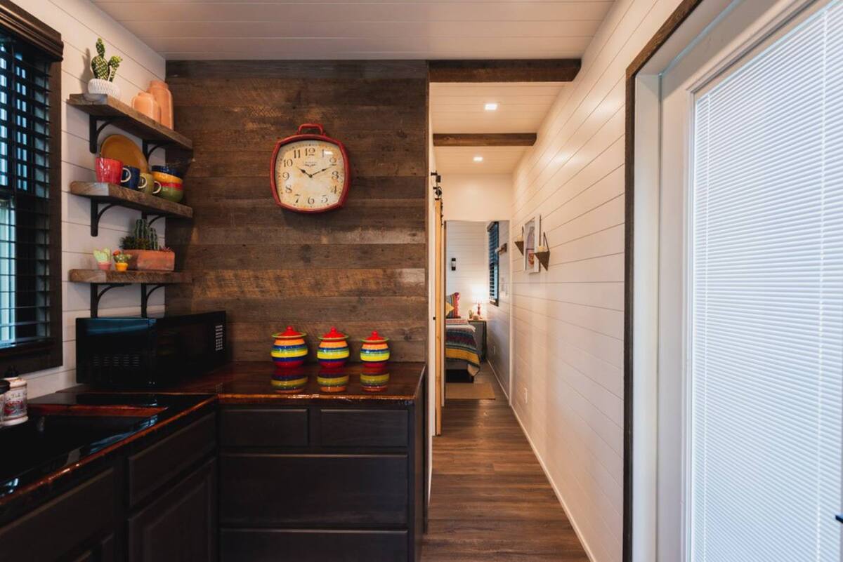 9 and a half foot ceilings with barn wood beams throughout.
