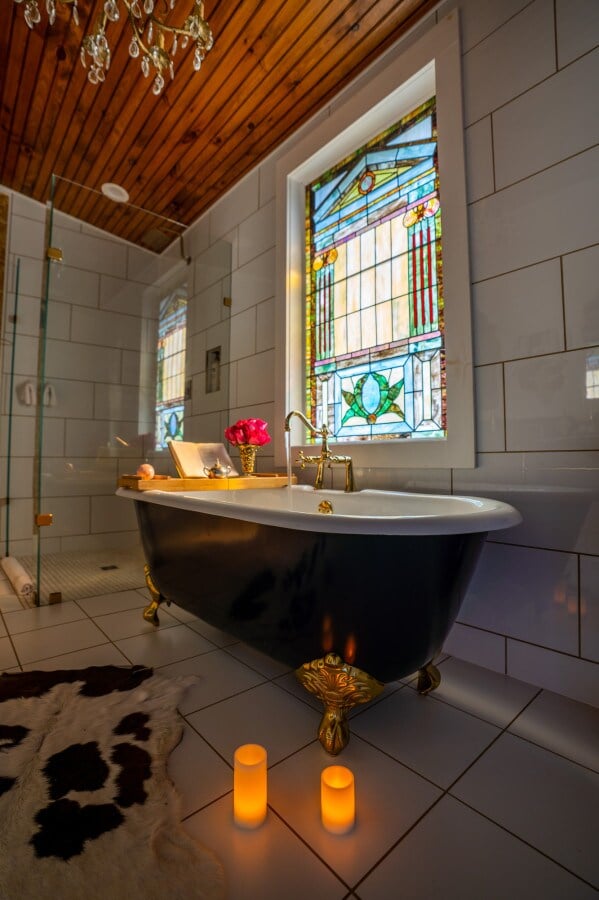 We prefer our faucets shaped like golden geese, our windows rescued from a local church, and our bathtubs perched on claw feet.