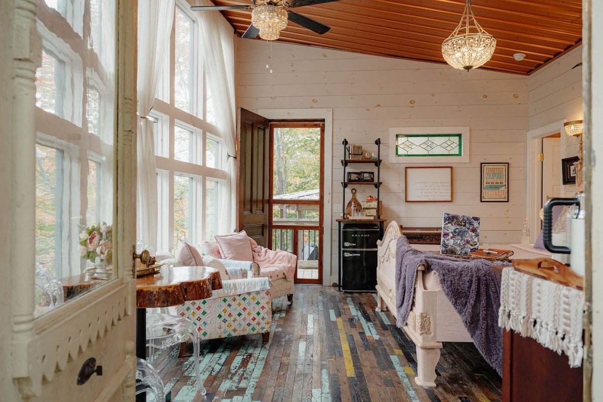 The bedroom features a king-size bed, jukebox, mini-fridge with freezer, air fryer, our house-blend drip coffee, games, and more!