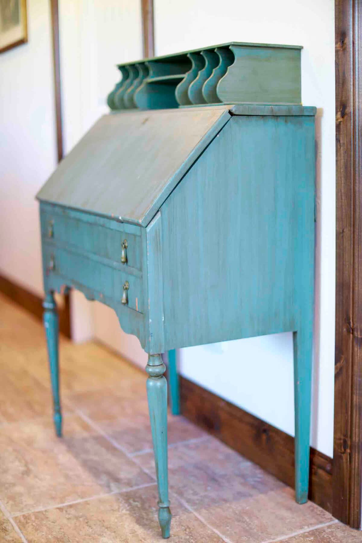 Bring your laptop to get work done or communicate with family and friends at the antique, fold-out desk.