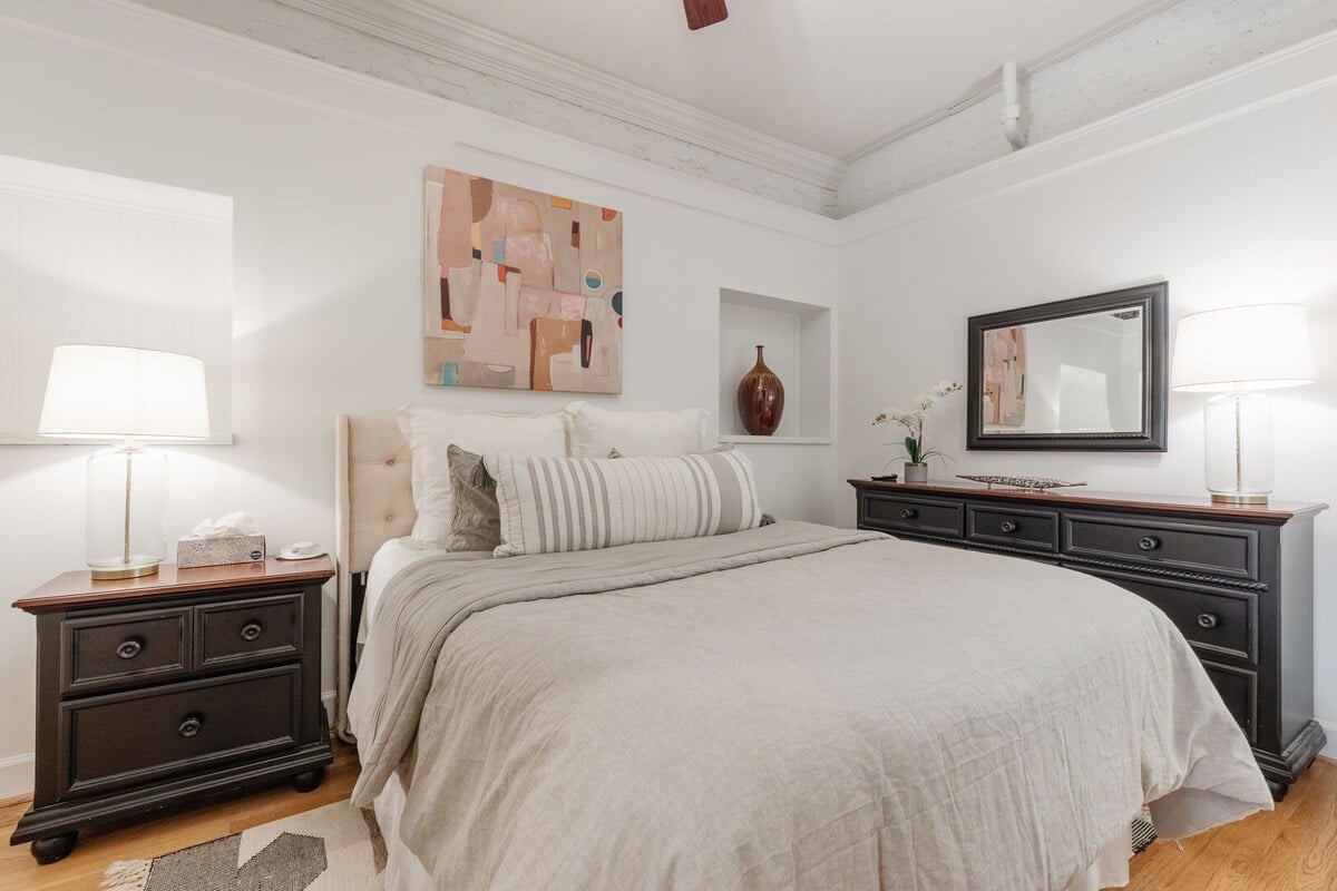This spacious bedroom includes quality, sustainable linens and a luxurious mattress for a dreamy night of sleep!