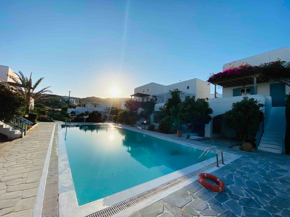 Find tranquility in this Mykonian-style villa with breathtaking views. in Tourlos, GR