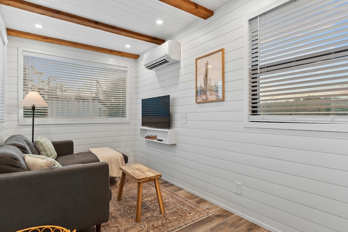 We've used barn-style cedar doors throughout the interior, we love how they warm up the space.