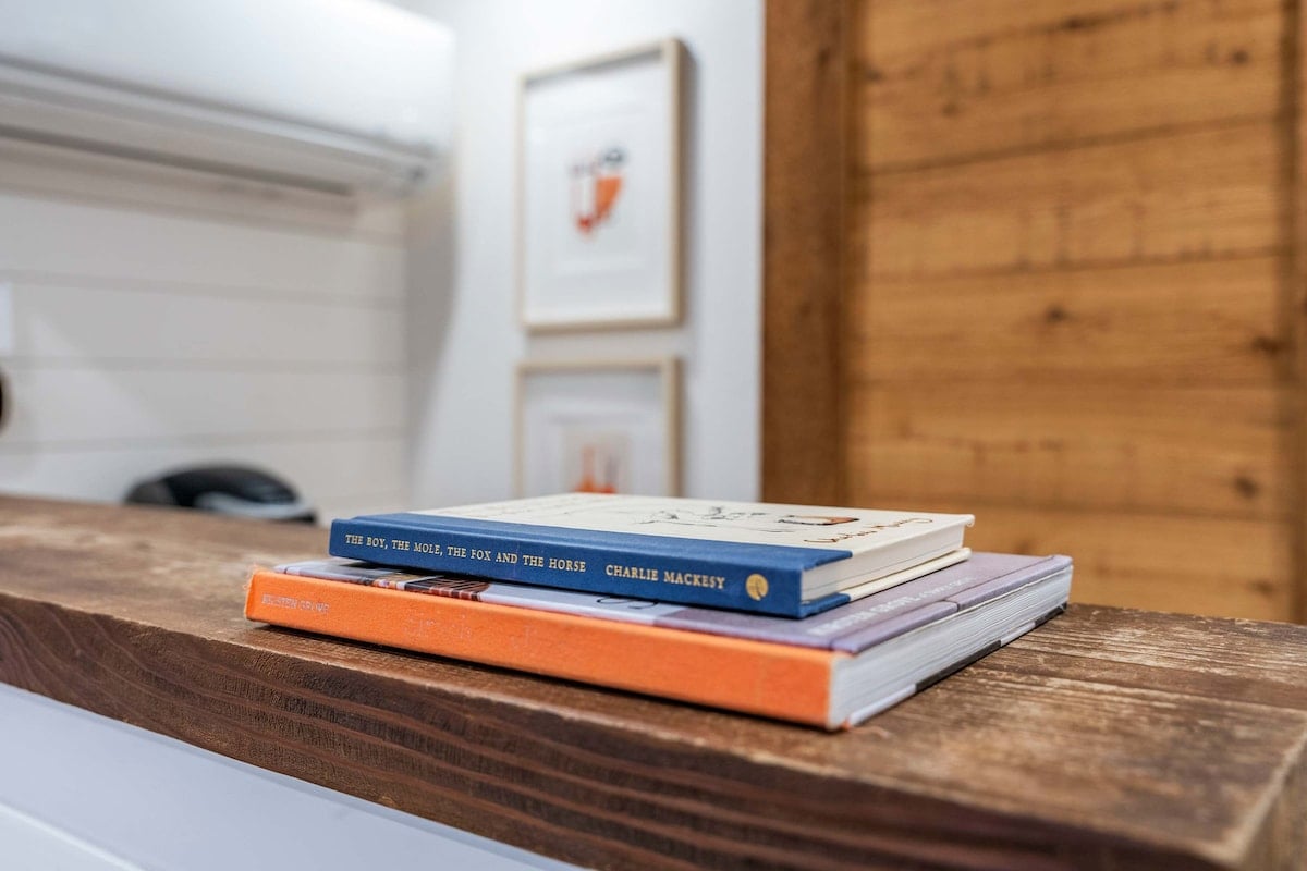 Everywhere you look, the reclaimed wood and warm cedar detailing infuse this home with unique character and a cozy, inviting atmosphere.