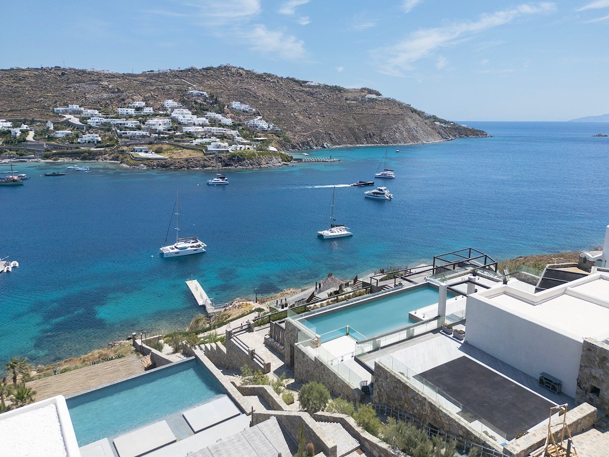 Experience the vibrant Ornos lifestyle from this chic retreat. in Ornos, GR