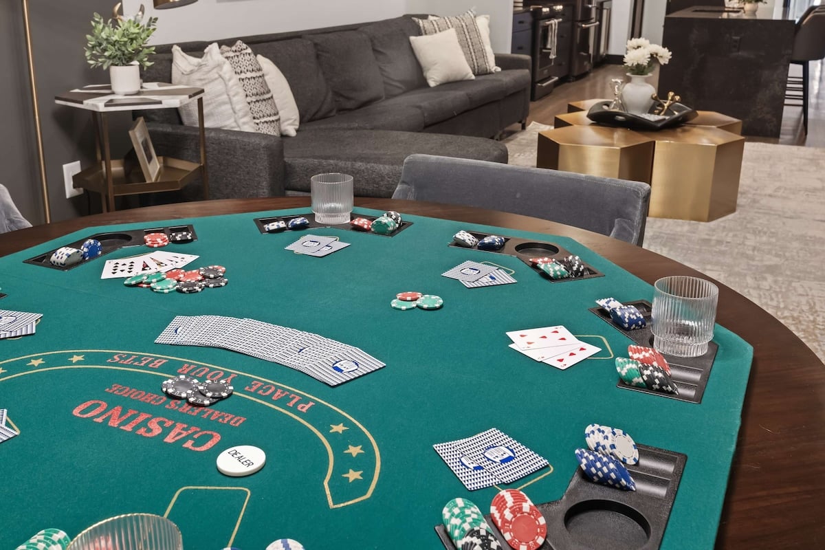 Enjoy a full Las Vegas–style setup with cards, chips, and drink holders at your private poker table—designed for unforgettable nights in.