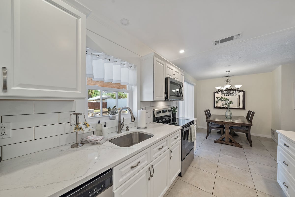 Flow from the kitchen into the beautiful dining room area.