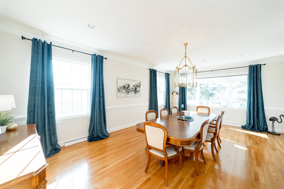 The dining room table seats 8 comfortably.