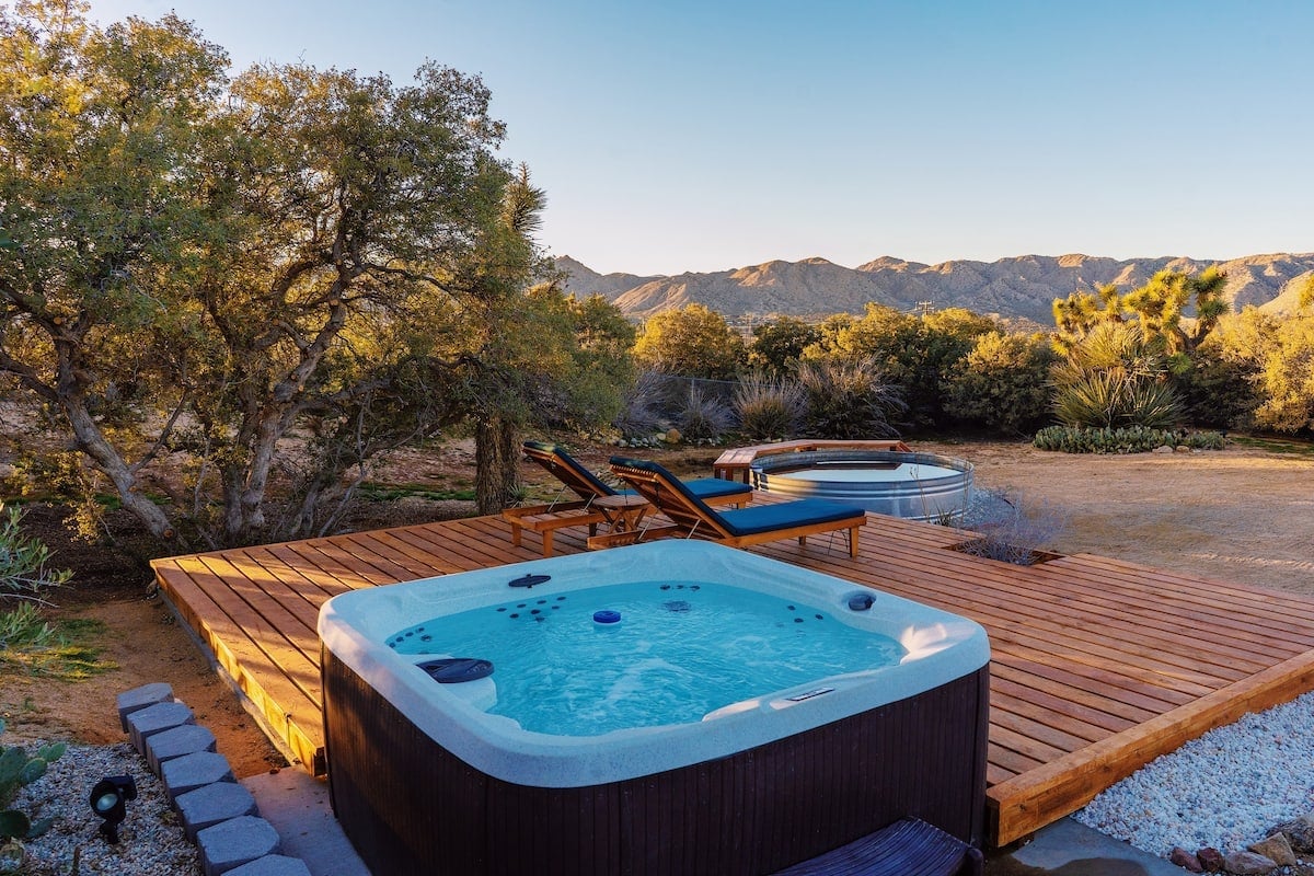 Your private oasis with hot tub, lounge chairs and stunning desert mountain views