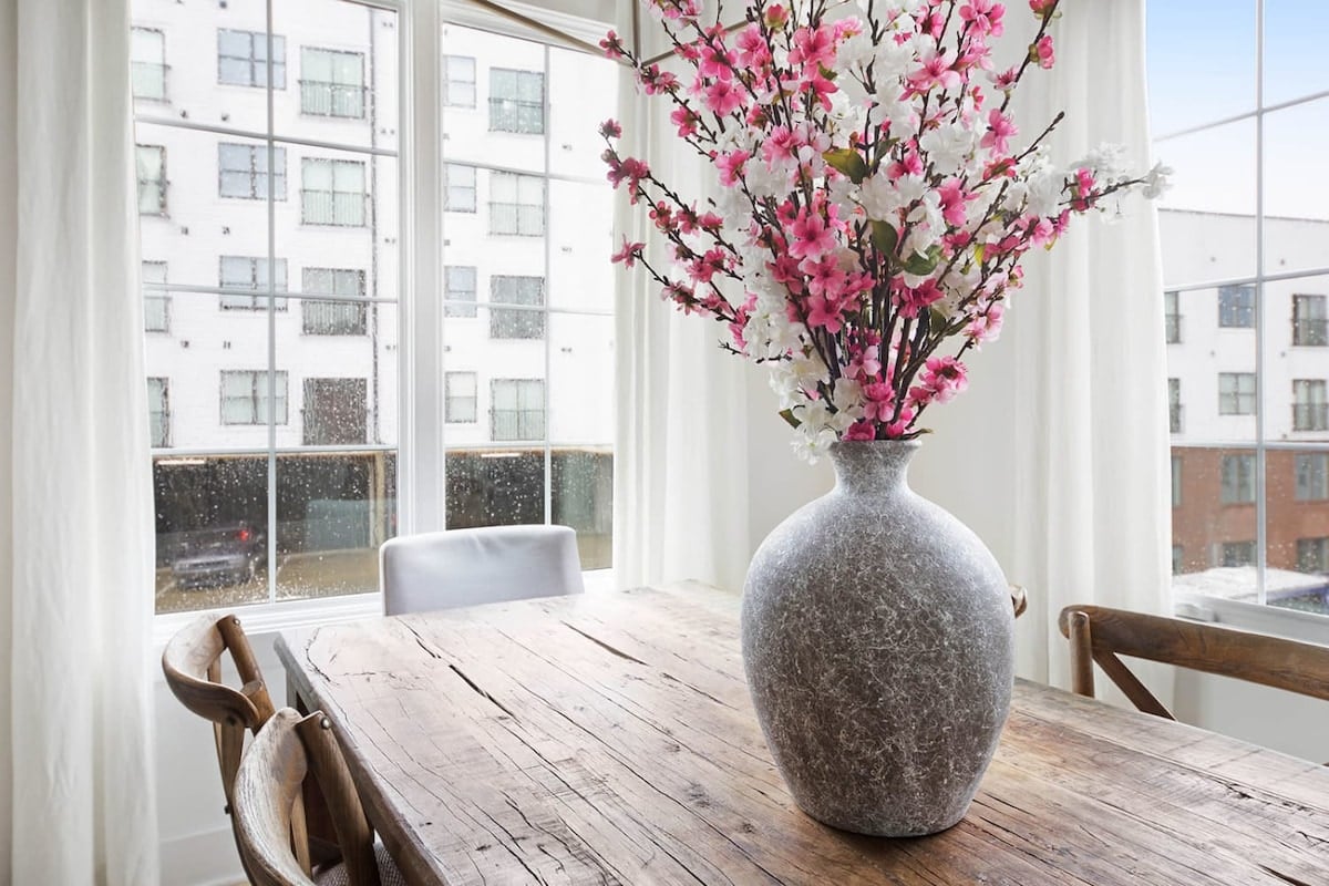Well-Designed 8-Seater Dining Table with Natural Light
