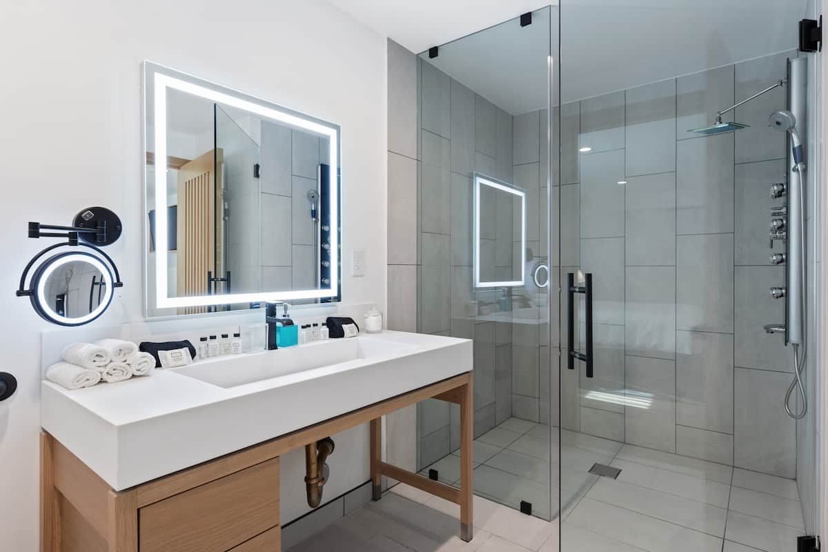 LED lit vanity mirrors and spacious rain shower to leave you feeling refreshed