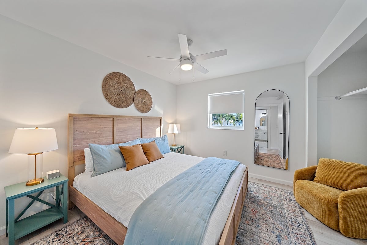 Bedroom 1 - King Bed. This bedroom features a comfortable and plush chair for relaxing or snuggling up with a good book!