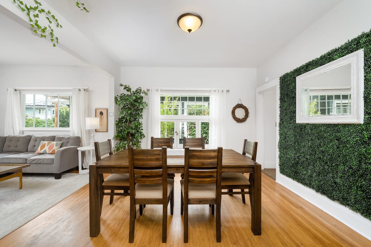 Vibrant greenery in the dining area adds to the serene ambiance, perfectly complementing the relaxed Portland vibe of the space.