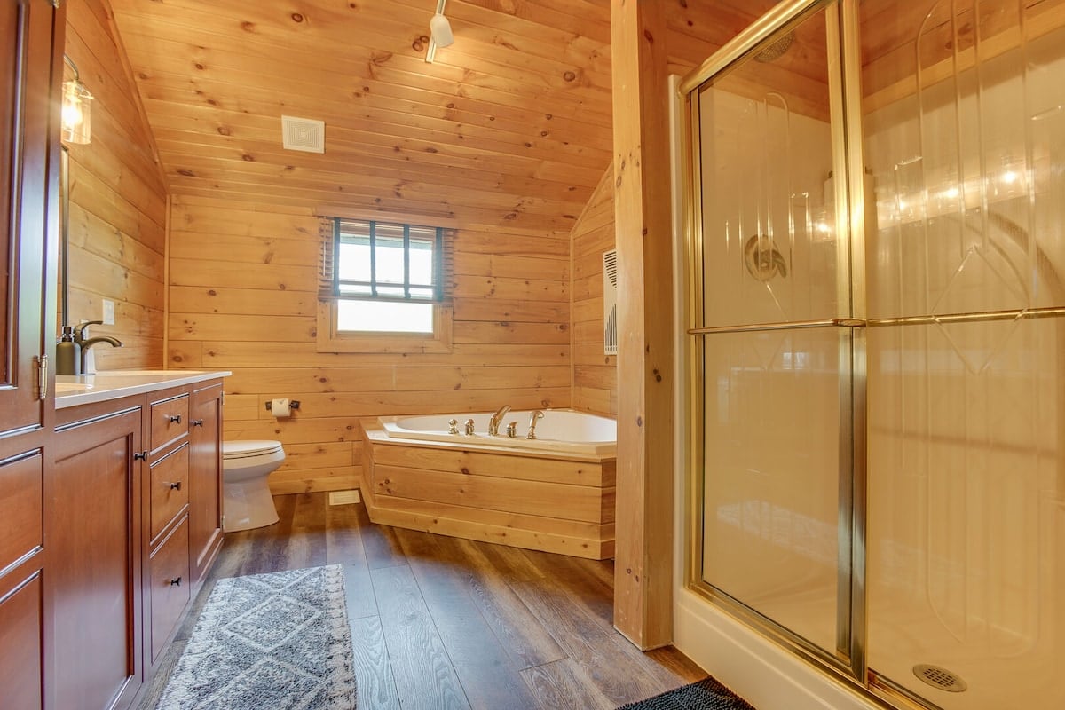 A full bathroom with a large bathtub!