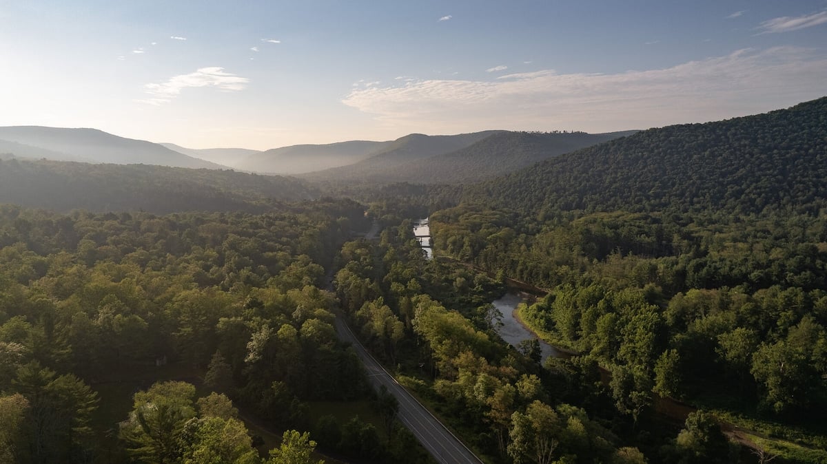 Aerial shot of the beautiful mountains that snuggle up to The Fireside Cabin!