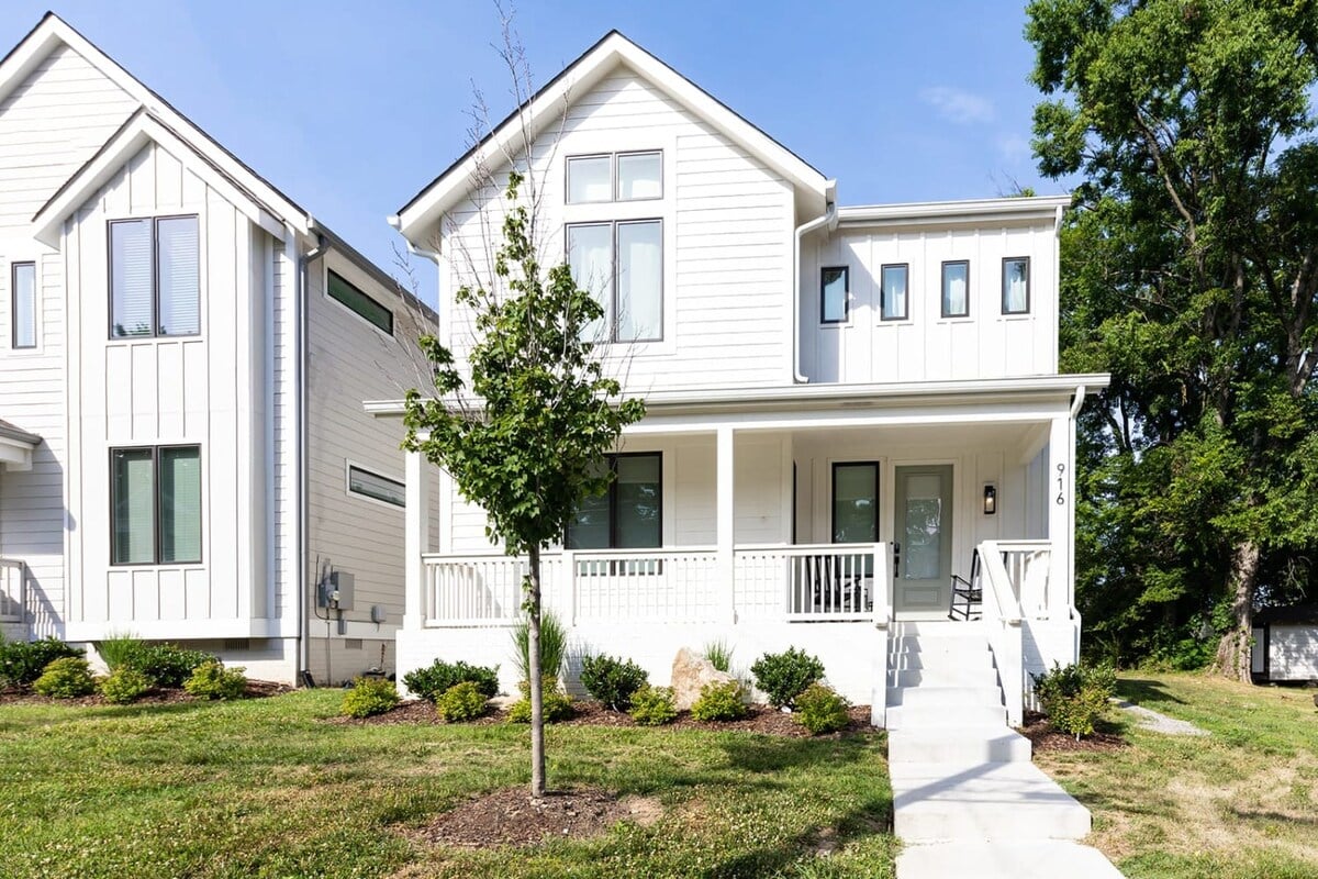 We love a fresh exterior with a large front porch