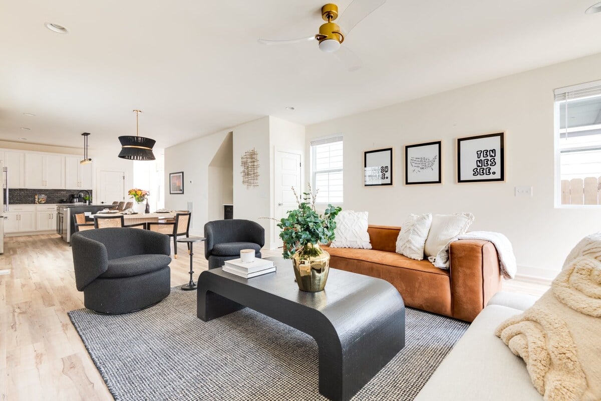 Tranquil Living Room with Modern Design and a Warm Fireplace Glow