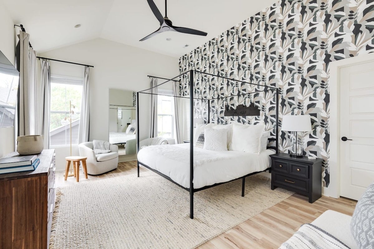 Spacious Bedroom with Soft Lighting and Thoughtful Décor