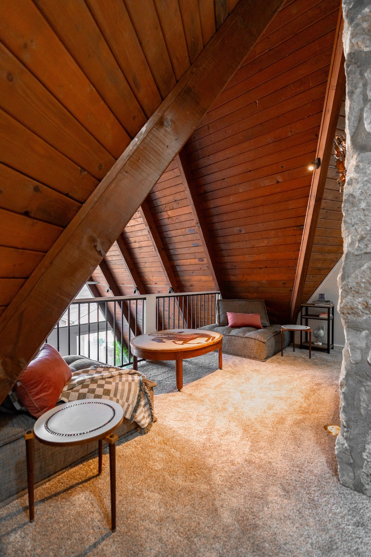 The loft has gorgeous decor and soft details to maximize comfort. It offers a secondary sitting space and is right beside the kids room.