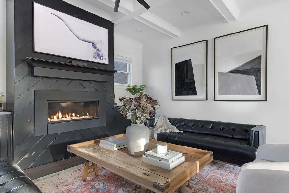 Warm Living Room with Fireplace and Comfortable Sofas
