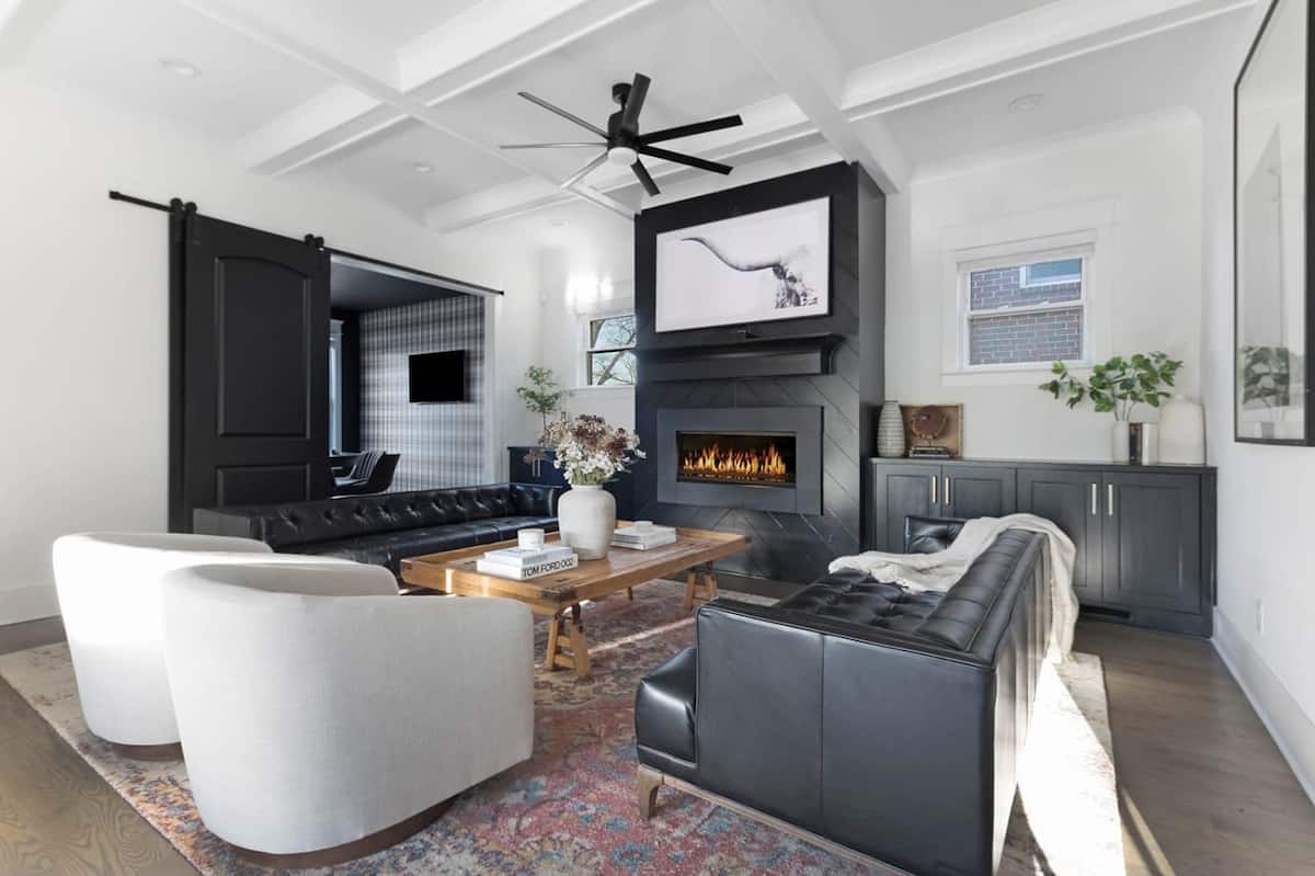 Warm Living Room with Fireplace and Comfortable Sofas