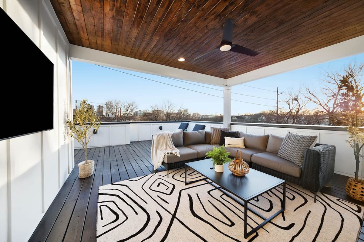 Open-Concept Living Room with Smart TV and Plush Seating