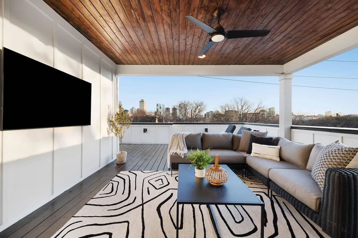 Open-Concept Living Room with Smart TV and Plush Seating