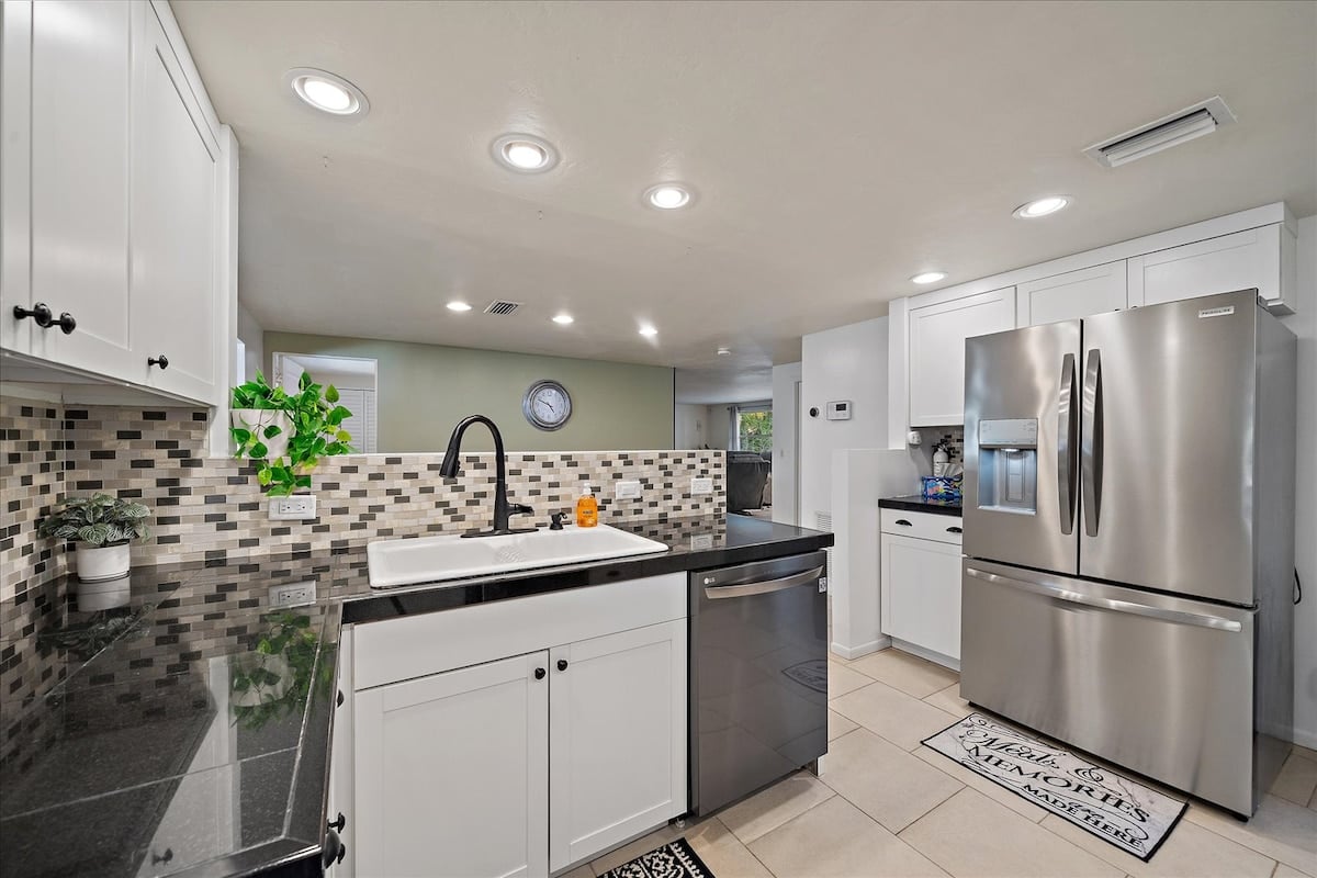 this home is equipped with stainless steel sleek appliances!