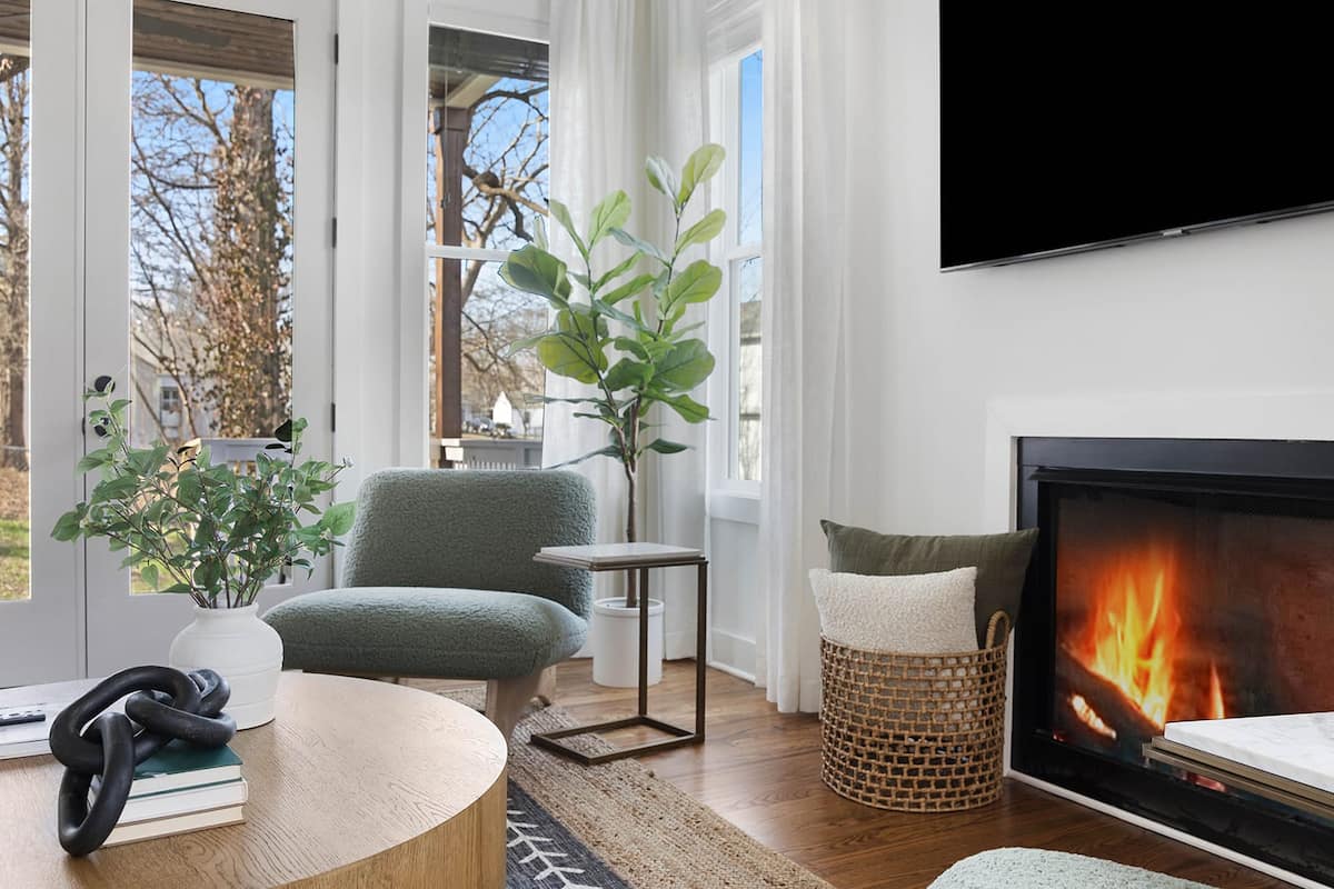 Warm Living Room with Fireplace and Comfortable Sofas