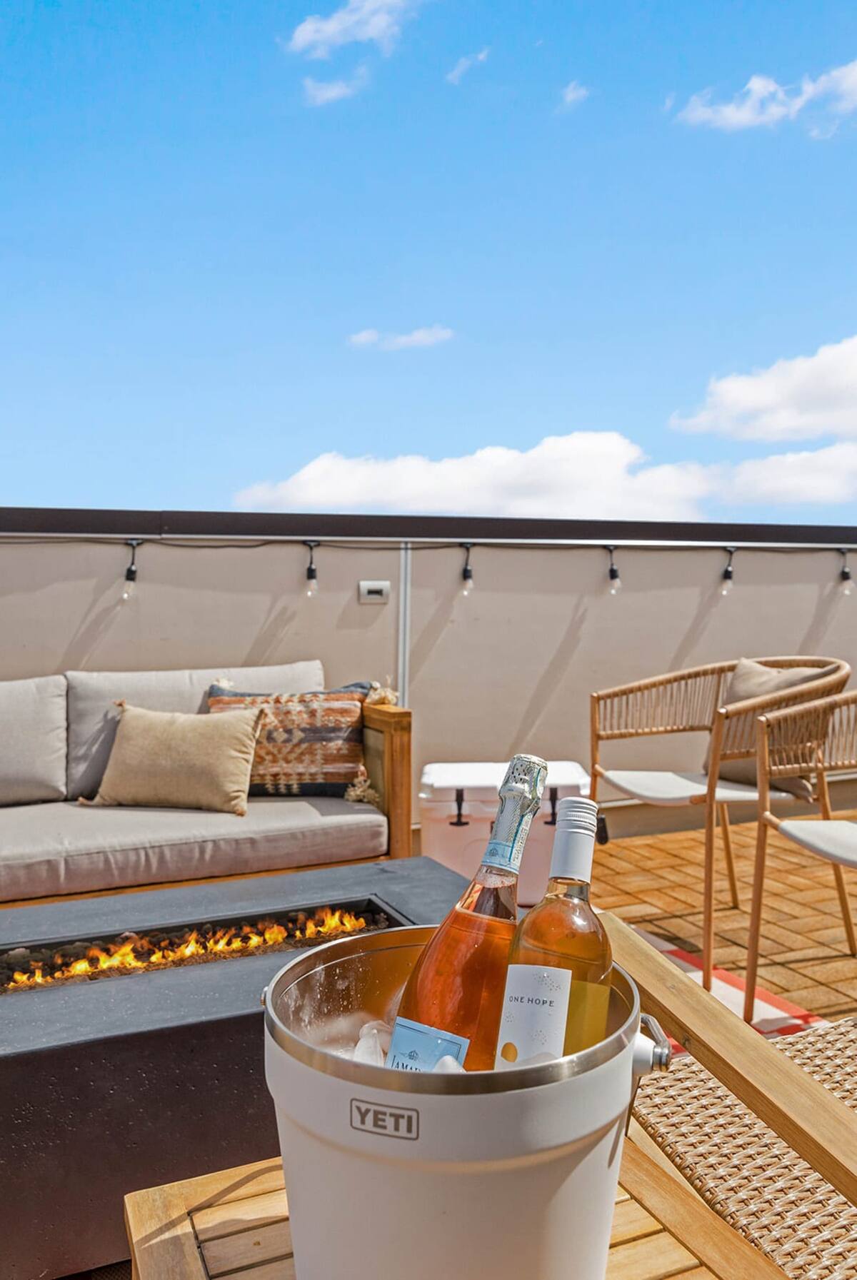 Cozy Rooftop Fire Pit Area Perfect for Gatherings and Relaxation