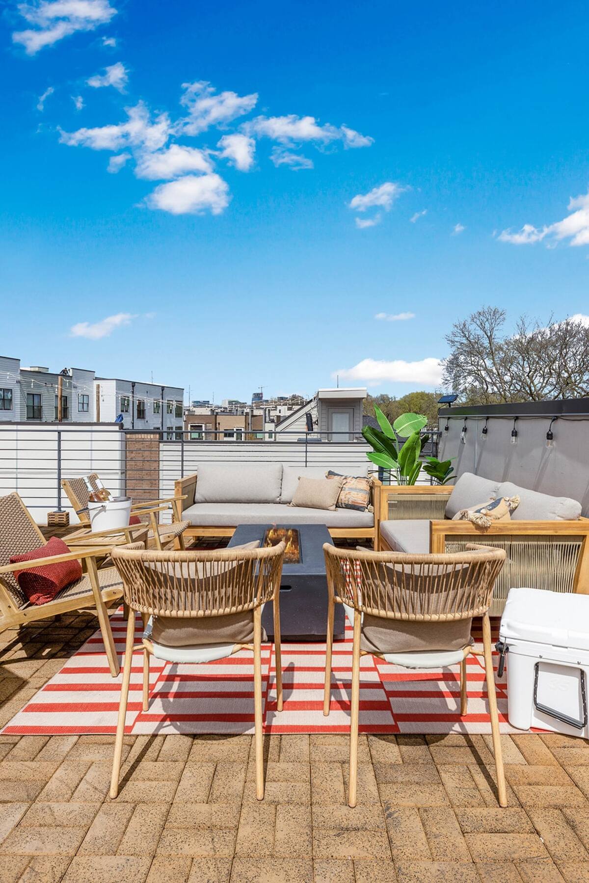 Cozy Rooftop Fire Pit Area Perfect for Evening Relaxation
