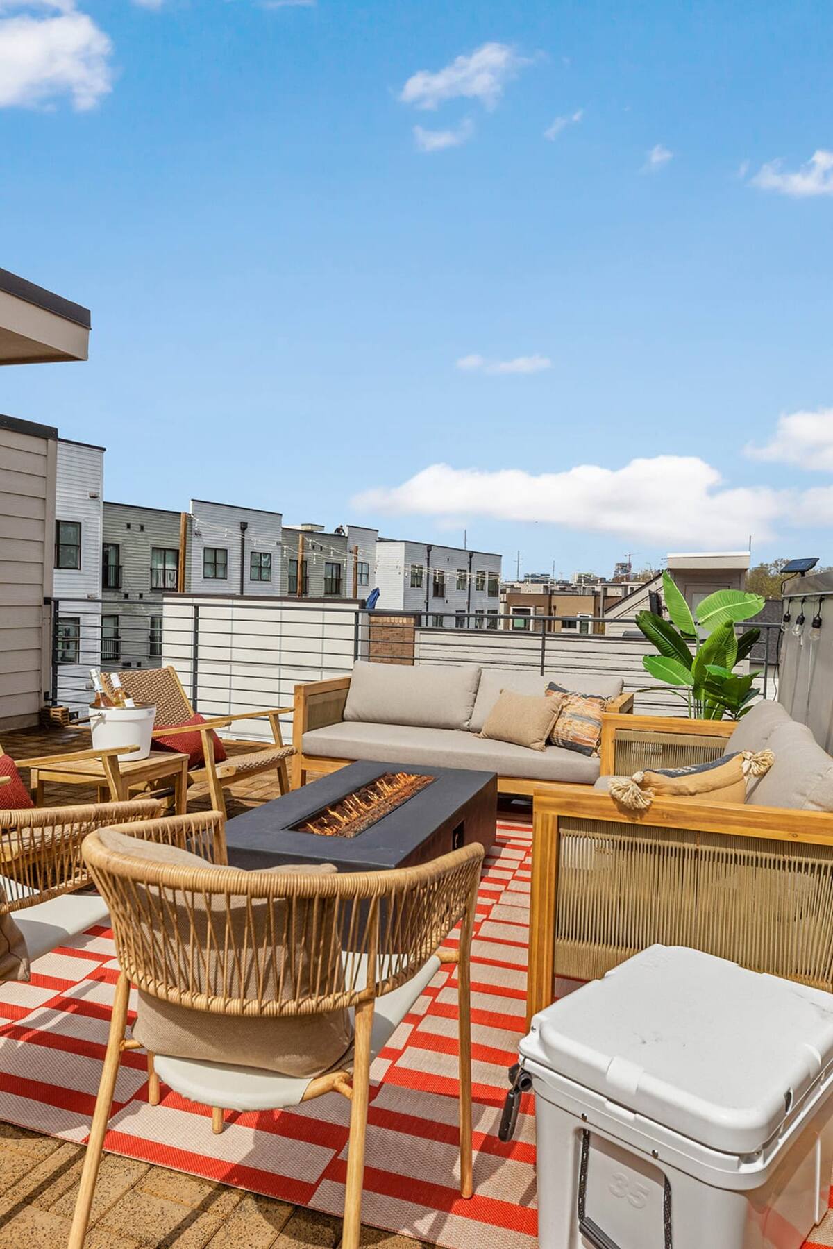 Cozy Rooftop Fire Pit Area Perfect for Evening Relaxation
